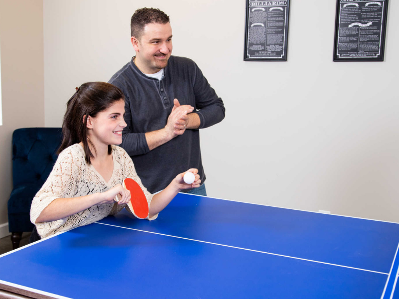 Hathaway Driftwood 7 Foot Air Hockey with table tennis top on display