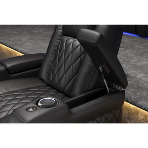 Valencia Tuscany Console Close-up of a black leather car seat with quilted design and cup holder.